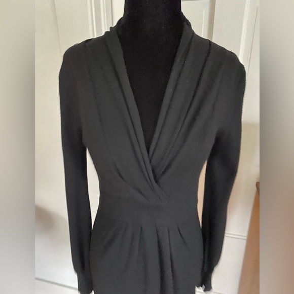 Kerisma Dresses & Skirts - Cashmere blend knit high waisted black Y2K dress with bell sleeves. Size M.